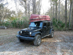 Two canoes on a Jeep Wrangler